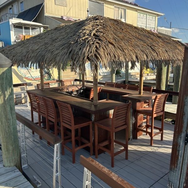 Open seating area on docked tiki boat near Long Beach Island marina